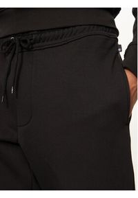 Timberland Spodnie dresowe TB0A5YFB0011 Czarny Regular Fit. Kolor: czarny. Materiał: bawełna #2