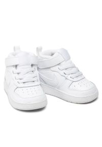 Buty Nike Court Borough Mid2 (TDV) Jr CD7784-100 białe. Kolor: biały. Materiał: skóra, syntetyk, materiał. Szerokość cholewki: normalna. Model: Nike Court
