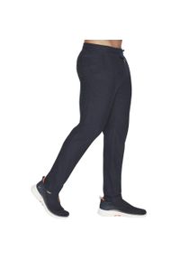 skechers - Spodnie sportowe męskie Skechers Ultra Go Lite Tapered Pant. Kolor: niebieski. Materiał: poliester, elastan