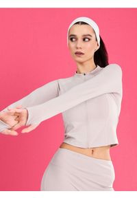Sinsay - Rozpinana sportowa bluza ze stójką i otworami na kciuki Gym Hard - kremowy. Typ kołnierza: kołnierzyk stójkowy. Kolor: kremowy #1
