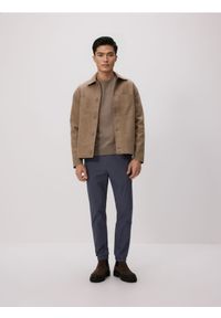 Reserved - Bawełniane spodnie jogger - granatowy. Kolor: niebieski. Materiał: bawełna