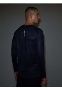 4f - 4F Longsleeve rowerowy szybkoschnący męski - czarny S. Kolor: czarny. Materiał: dzianina, włókno, syntetyk, materiał, elastan. Długość rękawa: długi rękaw. Długość: krótkie. Wzór: gładki, ze splotem. Sport: kolarstwo