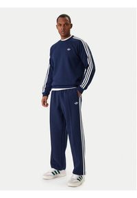 Adidas - adidas Spodnie dresowe adicolor Spacer Track KD4087 Granatowy Baggy Fit. Kolor: niebieski. Materiał: bawełna. Sport: turystyka piesza #4