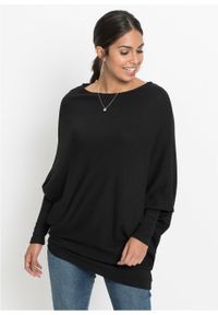 Sweter oversize z asymetrycznym dołem bonprix czarny. Kolor: czarny. Wzór: prążki #4
