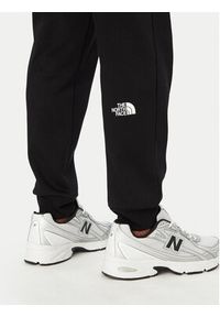 The North Face Spodnie dresowe Box Half Dome NF0A8JB0 Czarny Regular Fit. Kolor: czarny. Materiał: bawełna #2