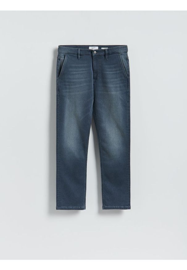 Reserved - Jeansy slim fit z efektem sprania - granatowy. Kolor: niebieski